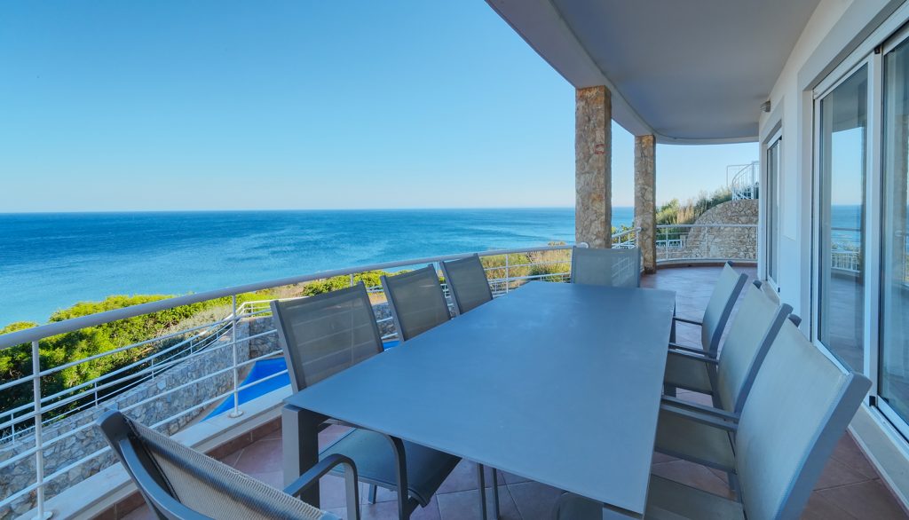 S Estevas Terrace view with dining table and sea