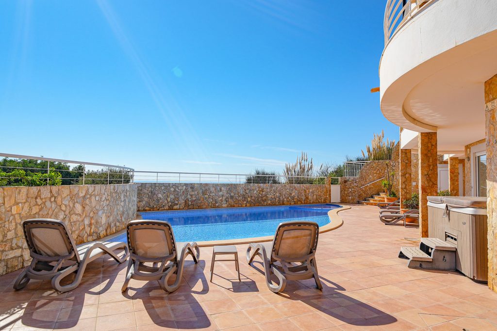 Estevas pool view from behind sunloungers